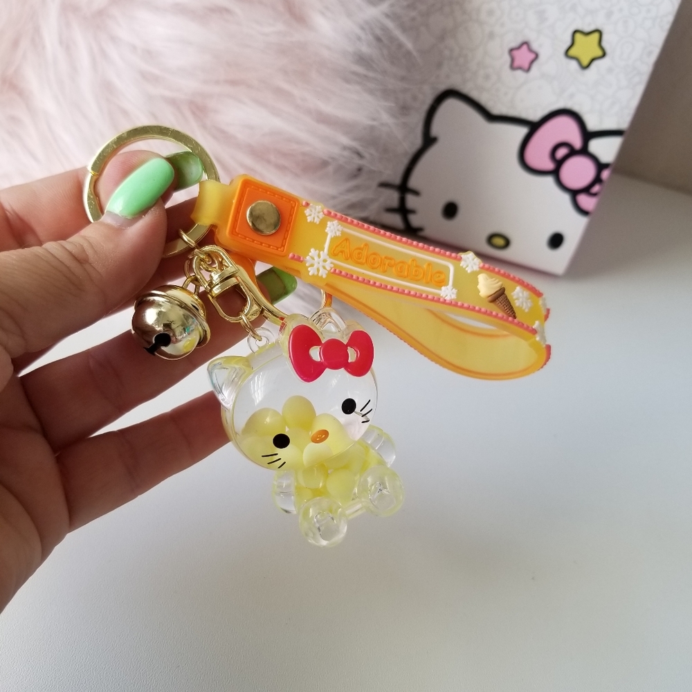 Hello Kitty Acrylic Key Chain Floating Oil Liquid Key Pendent New Last one!